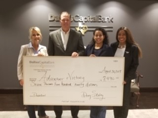 DCB presents check to fund programs